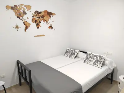 Cama o camas de una habitación en LID GARRUCHA - 4 min Playa Las Marinas - 1 min Paseo Malecón - Wi-Fi y Garaje