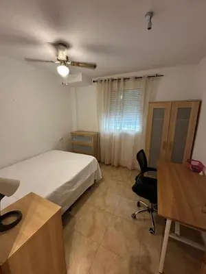 Cama o camas de una habitación en tuAnfitrion Almería Beach I