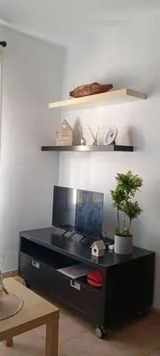 Una televisión o centro de entretenimiento en tuAnfitrion Almería Beach I
