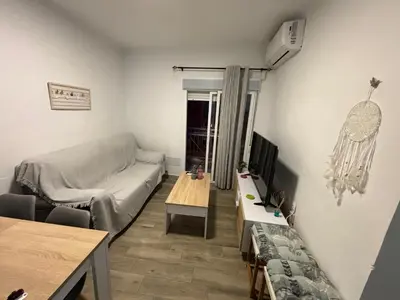 Una televisión o centro de entretenimiento en tuAnfitrion Almería Beach II