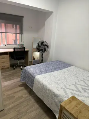 Cama o camas de una habitación en tuAnfitrion Almería Beach II