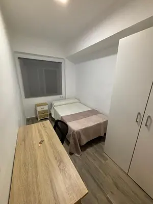 Cama o camas de una habitación en tuAnfitrion Almería Beach II