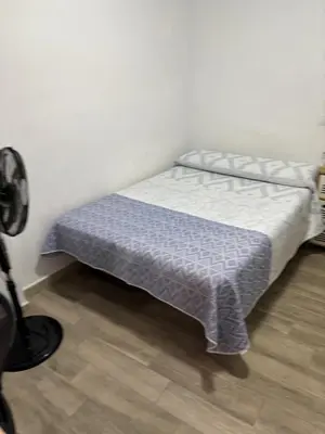 Cama o camas de una habitación en tuAnfitrion Almería Beach II