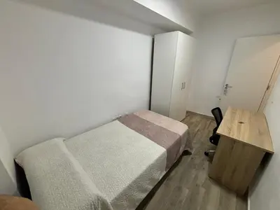 Cama o camas de una habitación en tuAnfitrion Almería Beach II