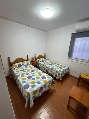 Cama o camas de una habitación en Faro de Mar