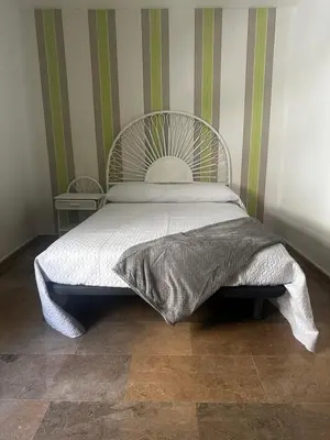Cama o camas de una habitación en Piso Adrimar