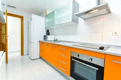 Una cocina o zona de cocina en PLAYA LEVANTE céntrico y con Parking By Aloha Palma