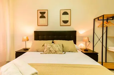 Cama o camas de una habitación en PLAYA LEVANTE céntrico y con Parking By Aloha Palma