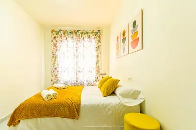 Cama o camas de una habitación en PLAYA LEVANTE céntrico y con Parking By Aloha Palma