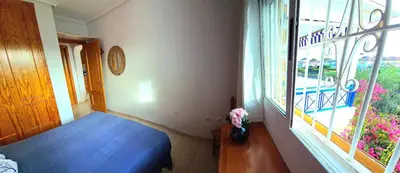 Cama o camas de una habitación en Ático VERAMAR 3 1 dormitorio con vistas al mar 2º línea de playa