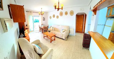 Zona de estar de Ático VERAMAR 3 1 dormitorio con vistas al mar 2º línea de playa