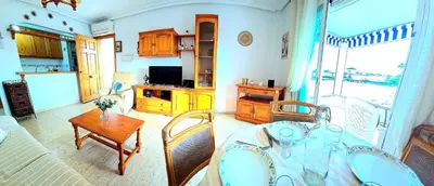 Una cocina o zona de cocina en Ático VERAMAR 3 1 dormitorio con vistas al mar 2º línea de playa