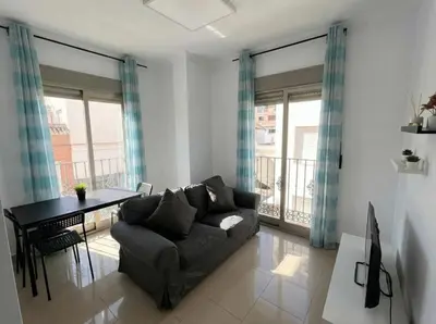 Zona de estar de Apartamento Moderno junto al Paseo y playa en Garrucha 2A