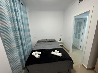 Cama o camas de una habitación en Apartamento Moderno junto al Paseo y playa en Garrucha 2A