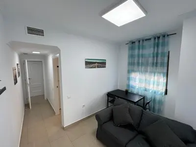 Zona de estar de Apartamento Moderno junto al Paseo y playa en Garrucha 2A