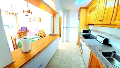Una cocina o zona de cocina en Apartamento dos dormitorios VERAMAR 5 1ª planta