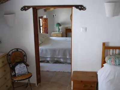 Cama o camas de una habitación en Almond Reef Casa Rural