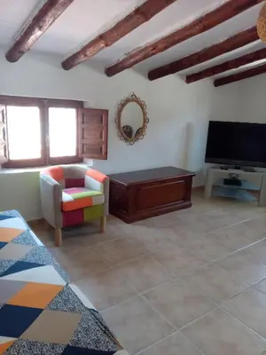 Una televisión o centro de entretenimiento en Almond Reef Casa Rural