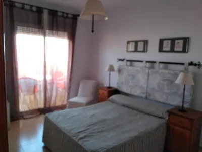 Cama o camas de una habitación en primera linea de playa