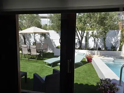 Piscina en o cerca de Anzuelo - Apartamento con piscina privada y jardín cerca de la playa aire acondicionado