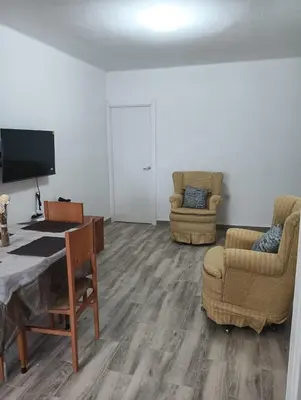 Una televisión o centro de entretenimiento en Apartamento Ribera