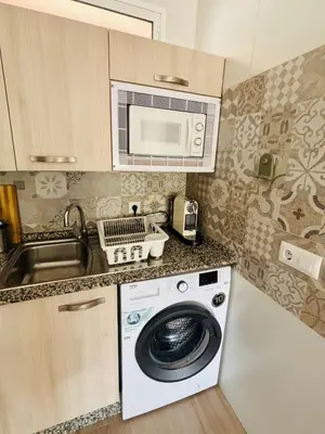 Una cocina o zona de cocina en CALARREONA - Apartamento a 100 metros de la playa