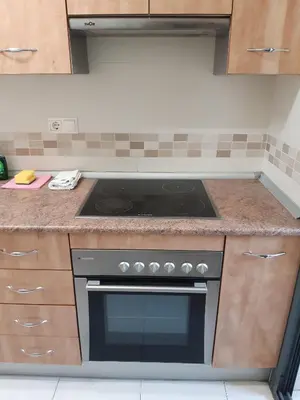 Una cocina o zona de cocina en Apartamento Alborania III grande, balcón, aparcamiento, entre el mar y el desierto