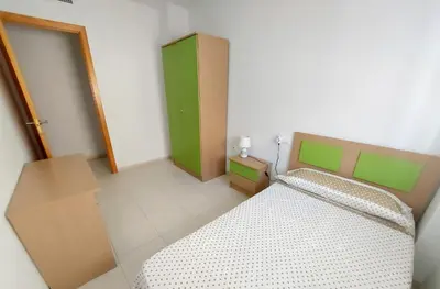 Cama o camas de una habitación en Apartamento Alborania III grande, balcón, aparcamiento, entre el mar y el desierto