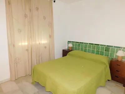 Cama o camas de una habitación en VISTA bahia 2