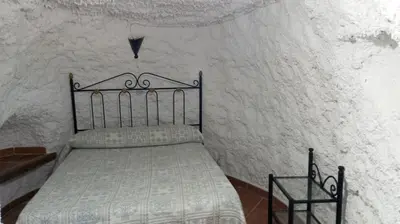 Cama o camas de una habitación en Alojamiento rural el Fandanguillo