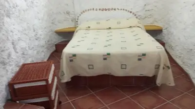 Cama o camas de una habitación en Alojamiento rural el Fandanguillo