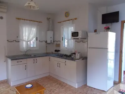 Una cocina o zona de cocina en Los Pinos