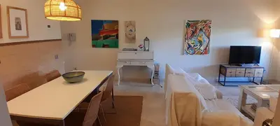 Una televisión o centro de entretenimiento en Valle del Este Golf vivienda vistas a campo de Golf