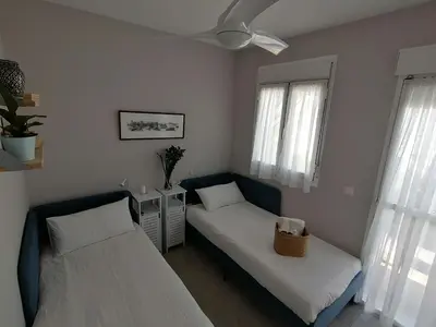 Cama o camas de una habitación en Casa increíble, playa, piscina, BBQ, vistas