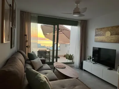Zona de estar de Cozy new penthouse apartment Cantal Homes