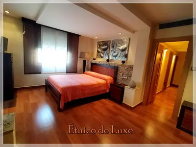Cama o camas de una habitación en ETNICO DE LUXE wifi y aparcamiento gratis