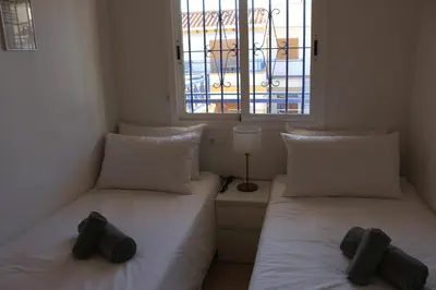 Cama o camas de una habitación en Vera Mar 5 Front Line Beach Apartment
