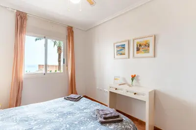 Cama o camas de una habitación en Marina de la Torre Sea View Family Apartment - Pool & Terrace
