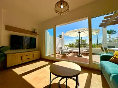 Una televisión o centro de entretenimiento en Casa Playa Paraiso