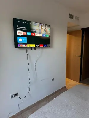 Una televisión o centro de entretenimiento en Apartmán se 2 ložnicemi
