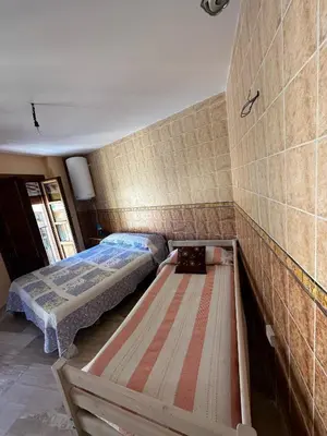 Cama o camas de una habitación en La casa de Felipe y Paquita