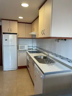 Una cocina o zona de cocina en Luxury apartment a 50m del mar