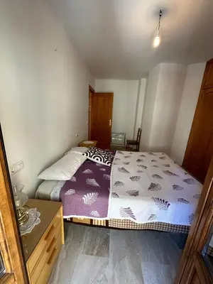 Cama o camas de una habitación en La gran casa de Felipe y Paquita