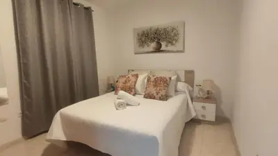 Cama o camas de una habitación en Expoholidays- Villasara