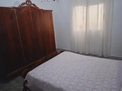 Cama o camas de una habitación en Amplio apartamento en zona céntrica de Nijar