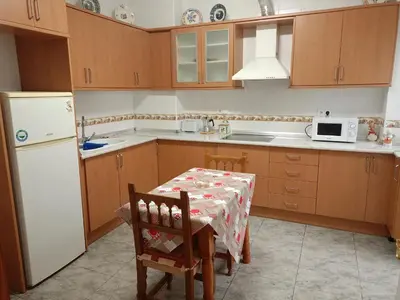 Una cocina o zona de cocina en Amplio apartamento en zona céntrica de Nijar