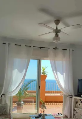 Una televisión o centro de entretenimiento en Vista Infinita