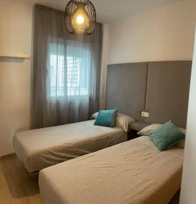 Cama o camas de una habitación en Bonito y tranquilo piso en Almerimar