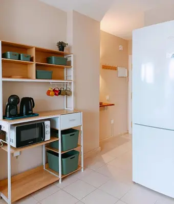 Una cocina o zona de cocina en Duna Suite con terraza y vistas al mar, piscina y playa a 7 min caminando