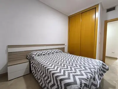 Cama o camas de una habitación en APARTAMENTOS TURISTICOS 3ºD CARLOS III - Cerca de la playa